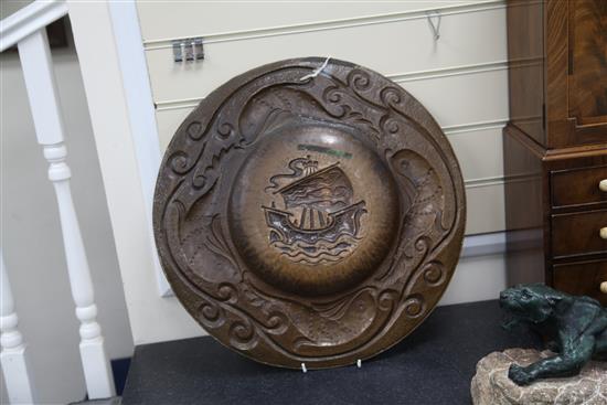 John Pearson. A Newlyn Arts & Crafts copper charger, 20.25in.
